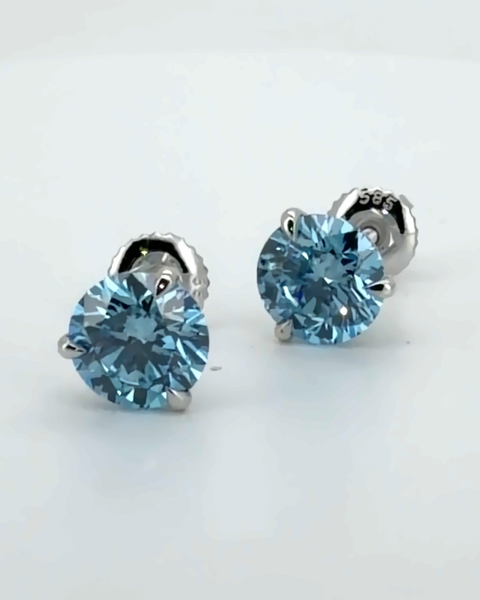 Blue round martini stud earrings, 14K white gold