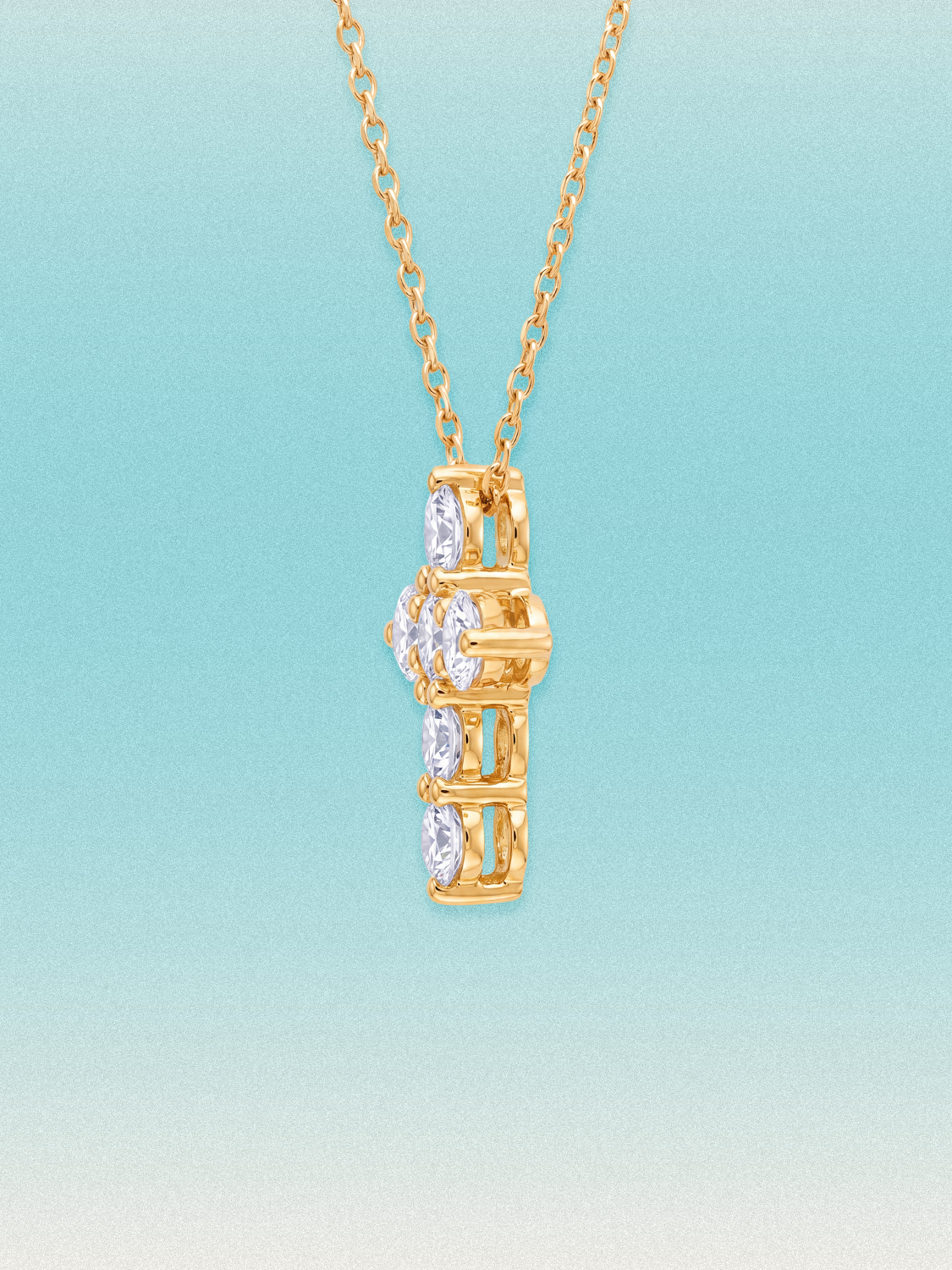 Close-up of the Bow Tie Lab Diamonds 1.55 ctw 7-stone cross pendant — seven round white lab-grown diamonds in a cross-shaped setting.