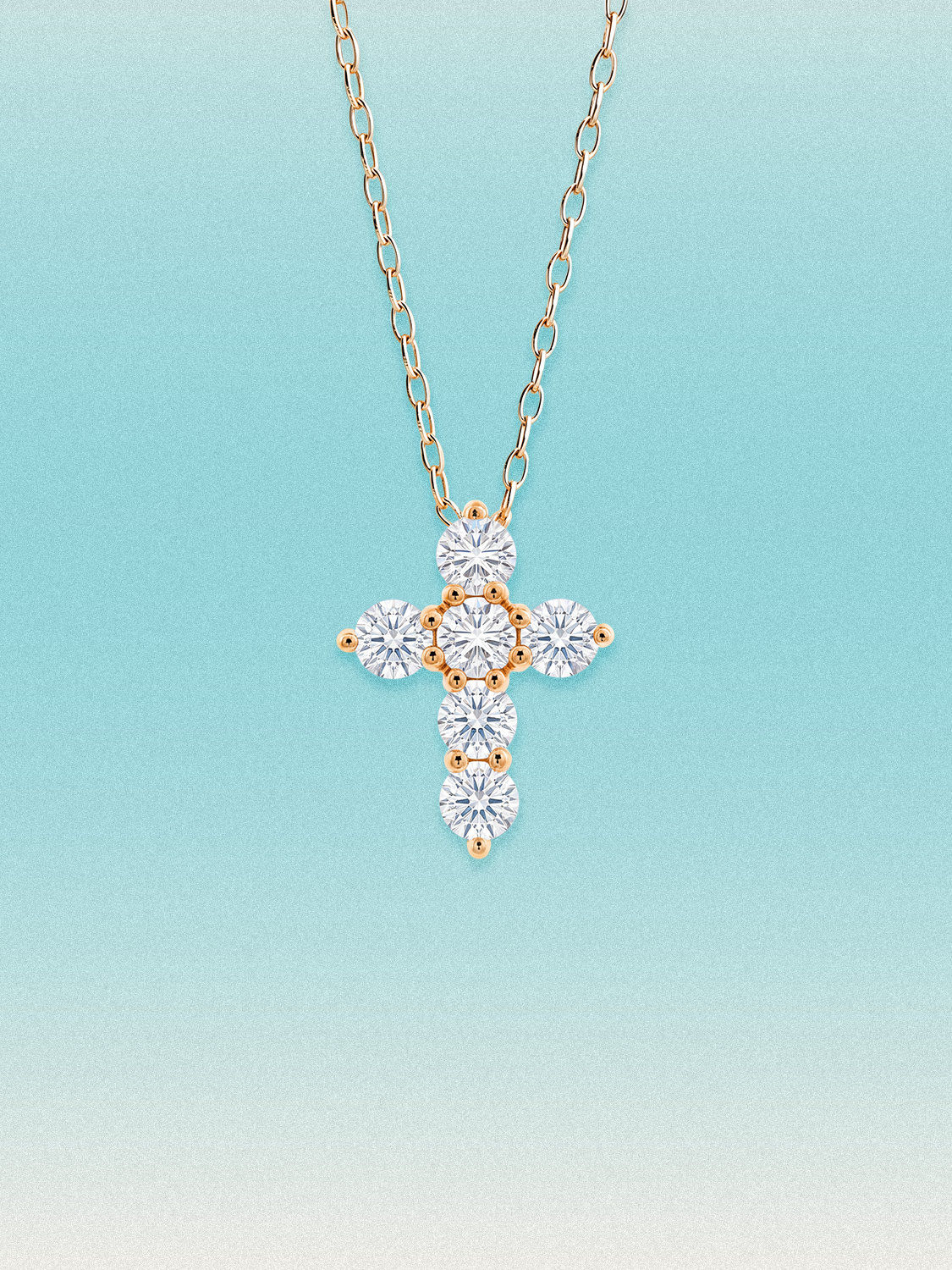 Bow Tie Lab Diamonds 1.55 ctw 7-stone cross pendant necklace — seven round white lab-grown diamonds set in a cross, shown in 14K rose gold on a delicate chain.
