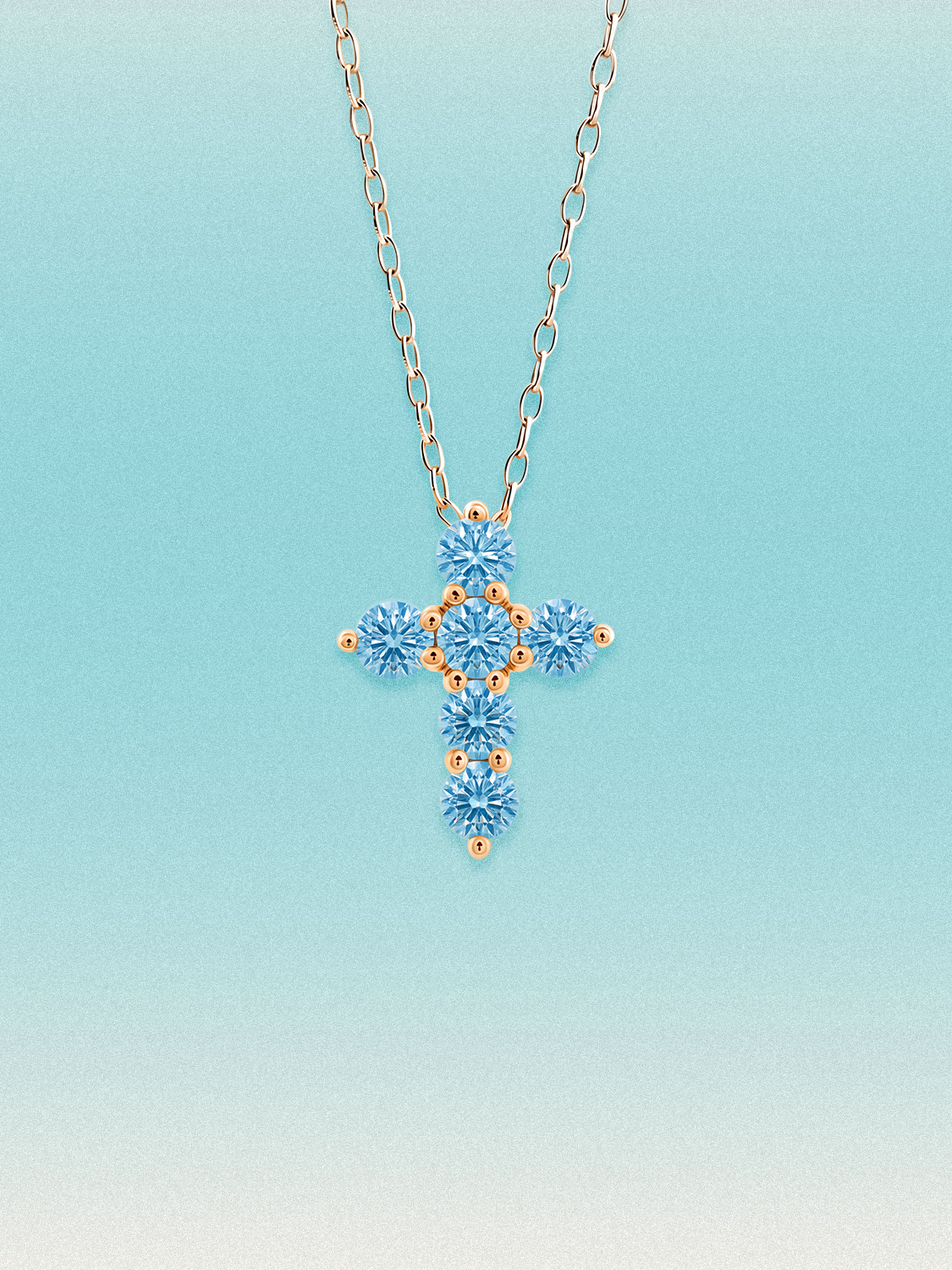 Bow Tie Lab Diamonds 1.55 ctw 7-stone Fancy Blue cross pendant necklace — round blue lab-grown diamonds set in a cross, shown in 14K rose gold on a delicate chain.
