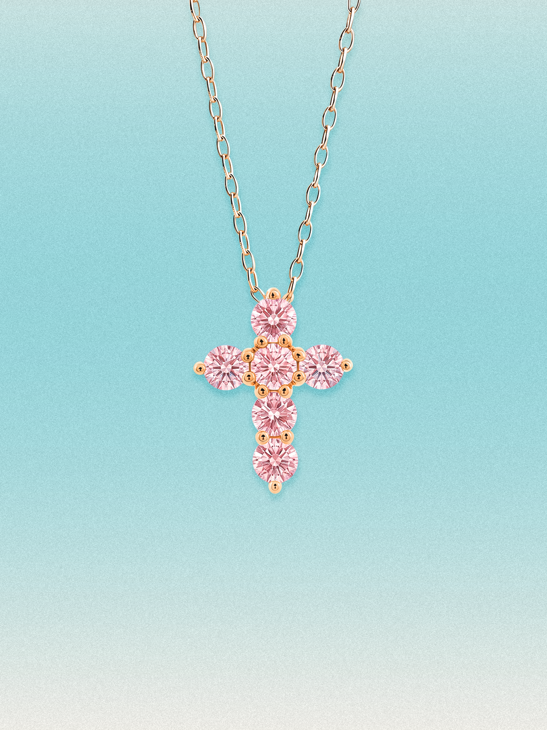 Bow Tie Lab Diamonds 1.55 ctw 7-stone Fancy Pink cross pendant necklace — round pink lab-grown diamonds set in a cross, shown in 14K rose gold on a delicate chain.