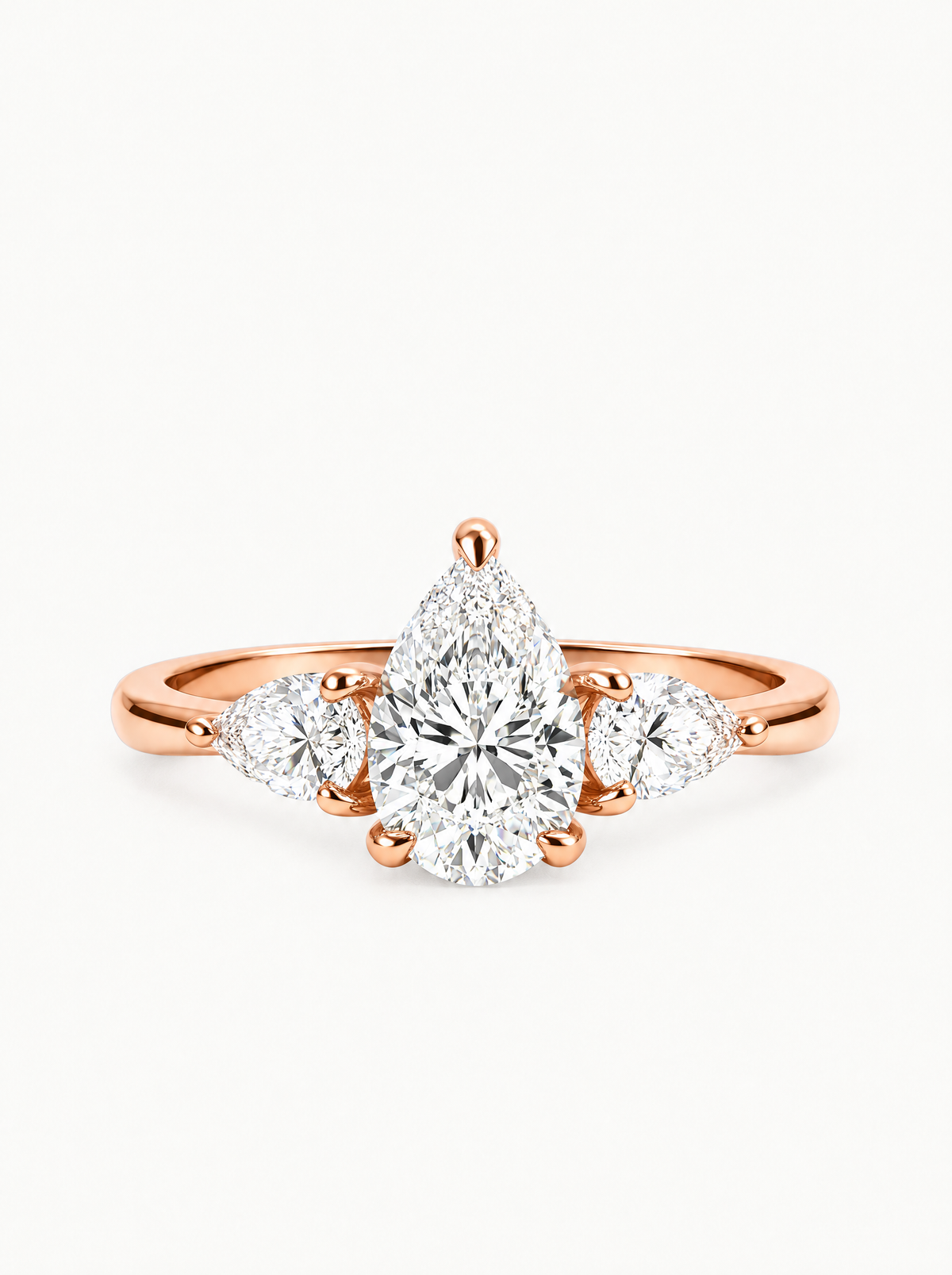 2.50 ctw Pear Three-Stone Lab-Grown Diamond Engagement Ring in 14K rose gold, front view — Bow Tie Lab Diamonds