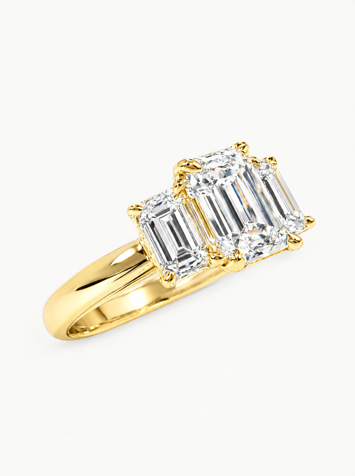3.00 ctw Emerald Three-Stone Lab-Grown Diamond Engagement Ring in 14K yellow gold, angled side view — Bow Tie Lab Diamonds