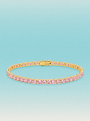 Bow Tie Lab Diamonds Fancy Pink 3.4mm (7.20 ctw) Round 4-Prong lab-grown diamond tennis bracelet — 48 round pink lab-grown diamonds, 7.20 ctw total, 7-inch, shown in 14K yellow gold.