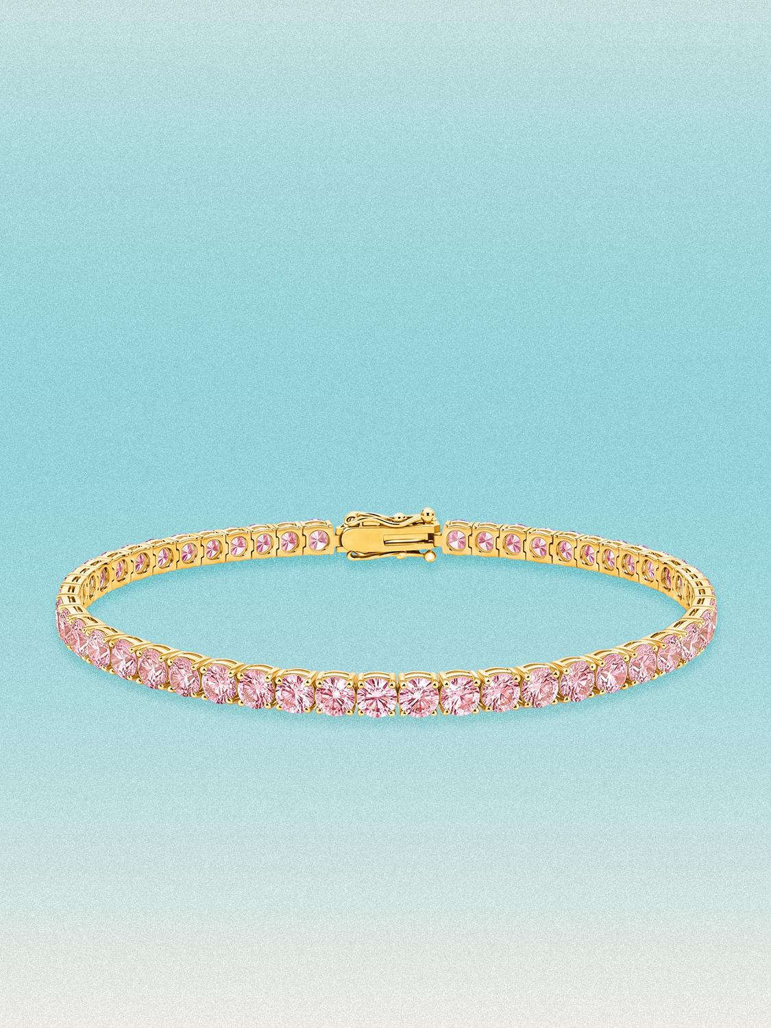 Bow Tie Lab Diamonds Fancy Pink 3.4mm (7.20 ctw) Round 4-Prong lab-grown diamond tennis bracelet — 48 round pink lab-grown diamonds, 7.20 ctw total, 7-inch, shown in 14K yellow gold.