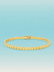 Bow Tie Lab Diamonds Fancy Yellow 3.4mm (7.20 ctw) Round 4-Prong lab-grown diamond tennis bracelet — 48 round yellow lab-grown diamonds, 7.20 ctw total, 7-inch, shown in 14K yellow gold.