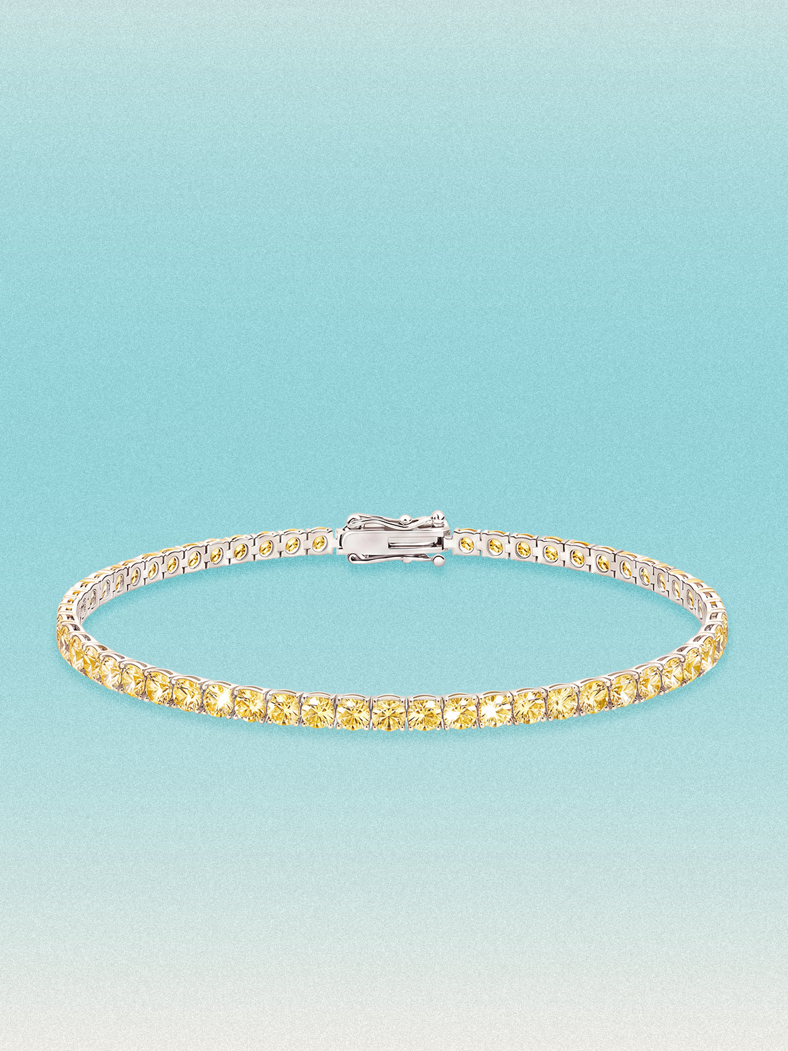 Bow Tie Lab Diamonds Fancy Yellow 3mm (5.50 ctw) Round 4-Prong lab-grown diamond tennis bracelet — 53 round yellow lab-grown diamonds, 5.50 ctw total, 7-inch, shown in 14K white gold.