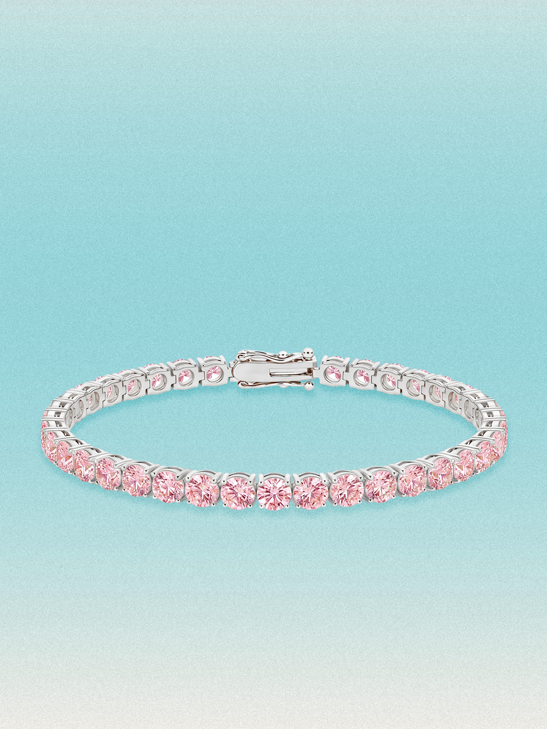 Bow Tie Lab Diamonds Fancy Pink 4.3mm (12.00 ctw) Round 4-Prong lab-grown diamond tennis bracelet — 39 round pink lab-grown diamonds, 12.00 ctw total, 7-inch, shown in 14K white gold.