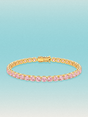 Bow Tie Lab Diamonds Fancy Pink 4.3mm (12.00 ctw) Round 4-Prong lab-grown diamond tennis bracelet — 39 round pink lab-grown diamonds, 12.00 ctw total, 7-inch, shown in 14K yellow gold.