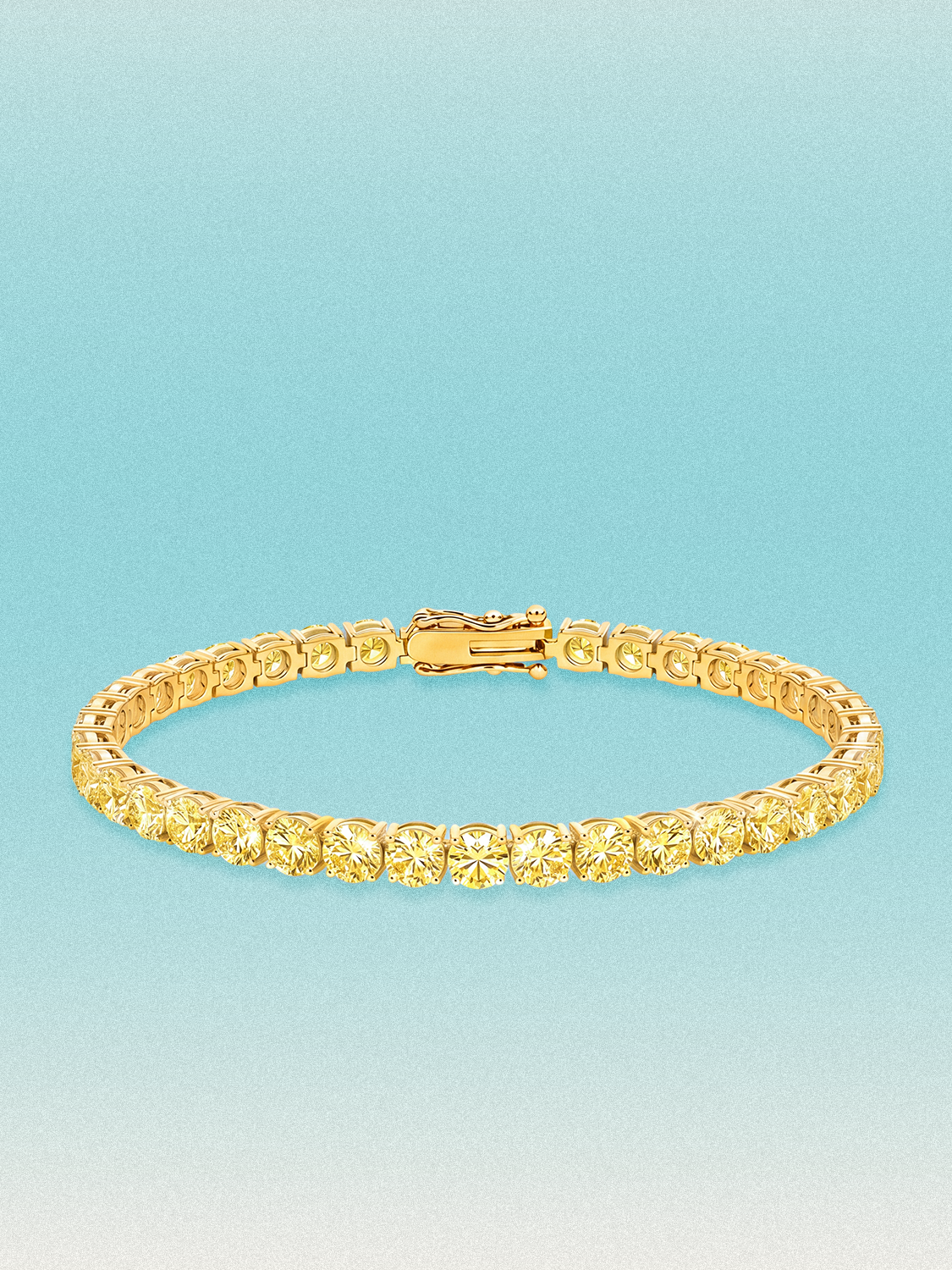 Bow Tie Lab Diamonds Fancy Yellow 4.3mm (12.00 ctw) Round 4-Prong lab-grown diamond tennis bracelet — 39 round yellow lab-grown diamonds, 12.00 ctw total, 7-inch, shown in 14K yellow gold.