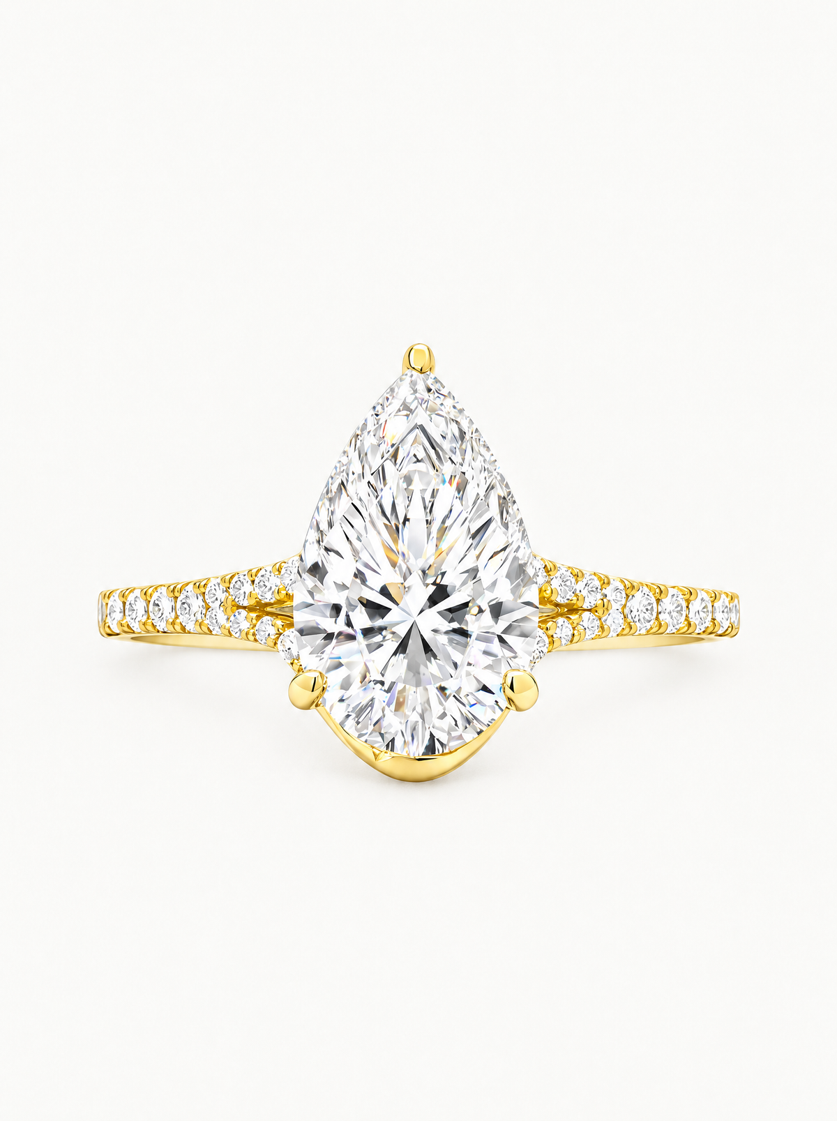 4.50 ctw Pear Hidden Halo Split Shank Pave Lab-Grown Diamond Engagement Ring in 14K yellow gold, front view — Bow Tie Lab Diamonds