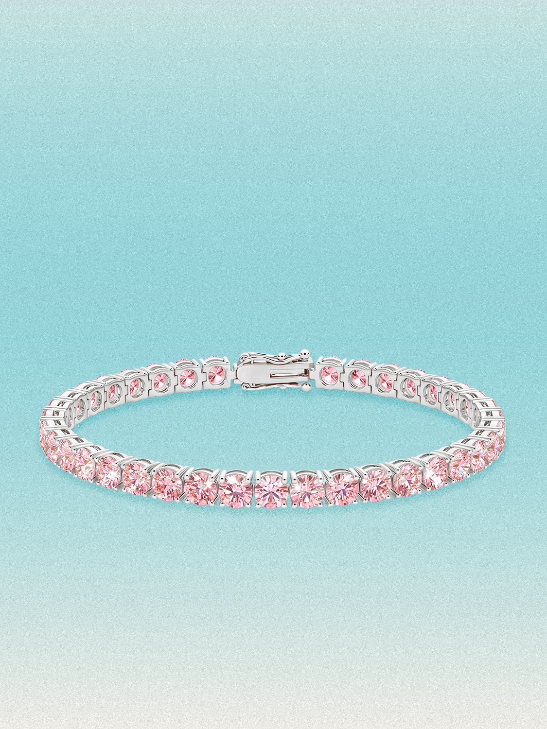 Bow Tie Lab Diamonds Fancy Pink 4.6mm (13.00 ctw) Round 4-Prong lab-grown diamond tennis bracelet — 37 round pink lab-grown diamonds, 13.00 ctw total, 7-inch, shown in 14K white gold.