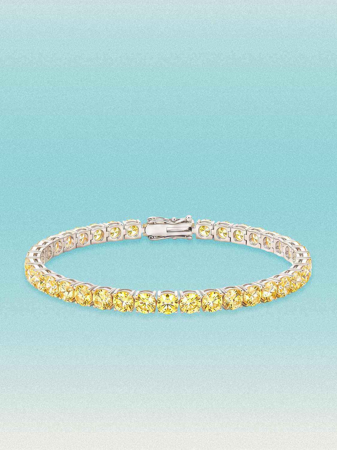 Bow Tie Lab Diamonds Fancy Yellow 4.6mm (13.00 ctw) Round 4-Prong lab-grown diamond tennis bracelet — 37 round yellow lab-grown diamonds, 13.00 ctw total, 7-inch, shown in 14K white gold.