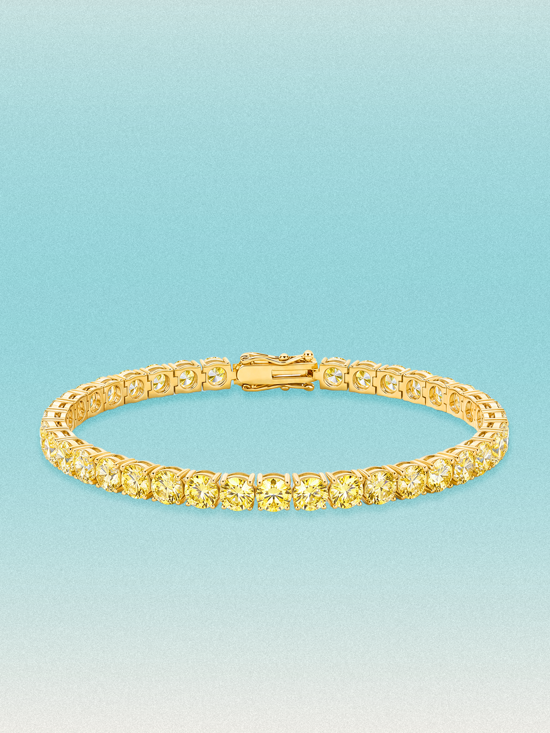 Bow Tie Lab Diamonds Fancy Yellow 4.6mm (13.00 ctw) Round 4-Prong lab-grown diamond tennis bracelet — 37 round yellow lab-grown diamonds, 13.00 ctw total, 7-inch, shown in 14K yellow gold.