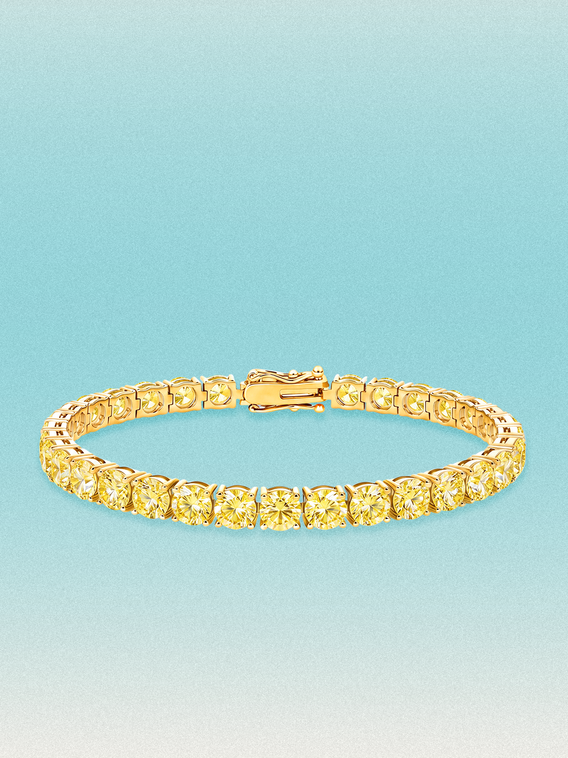 Bow Tie Lab Diamonds Fancy Yellow 5.2mm (17.00 ctw) Round 4-Prong lab-grown diamond tennis bracelet — 32 round yellow lab-grown diamonds, 17.00 ctw total, 7-inch, shown in 14K yellow gold.