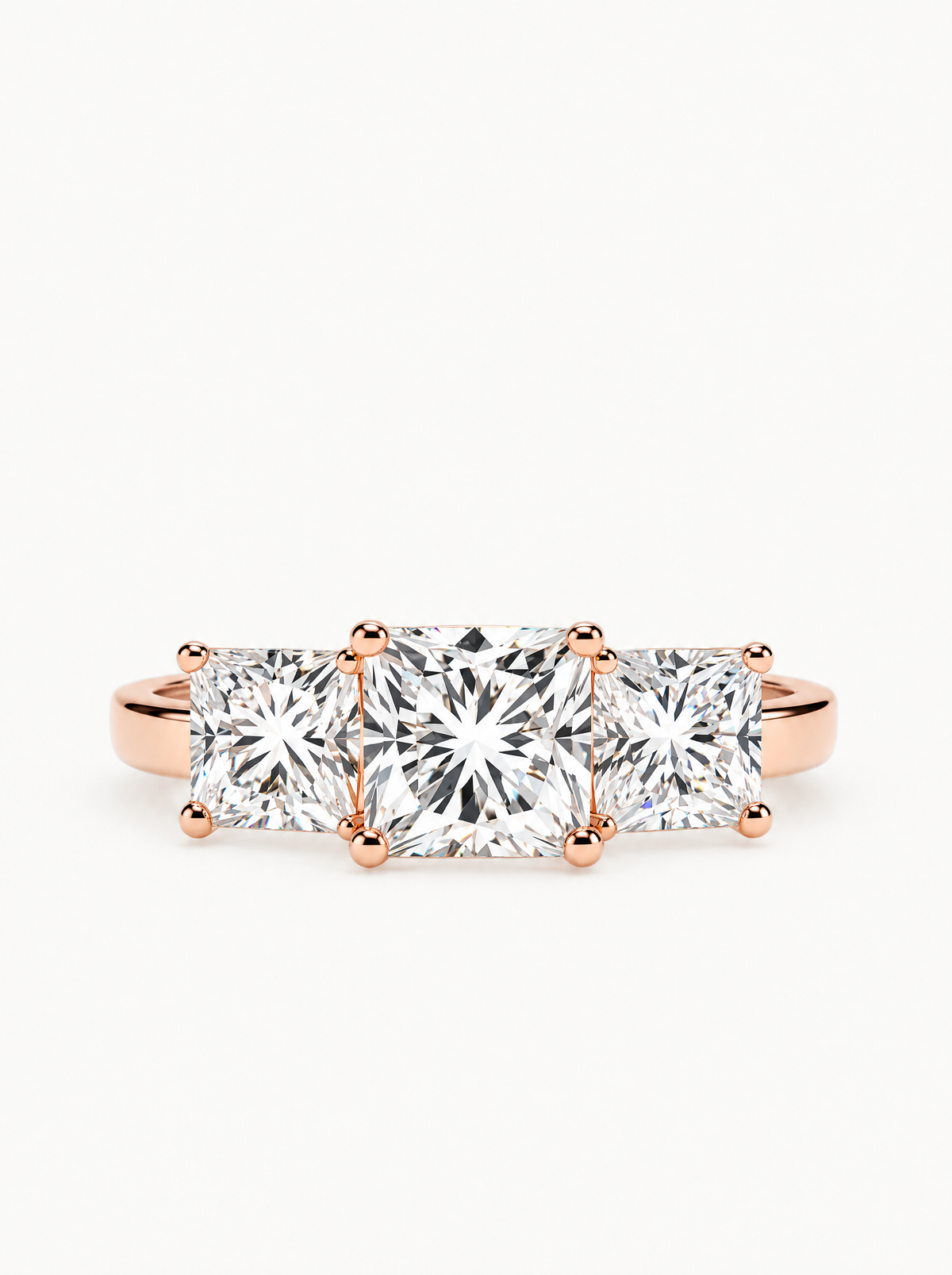 5.50 ctw Princess Three Stone Lab-Grown Diamond Engagement Ring in 14K rose gold, front view — Bow Tie Lab Diamonds