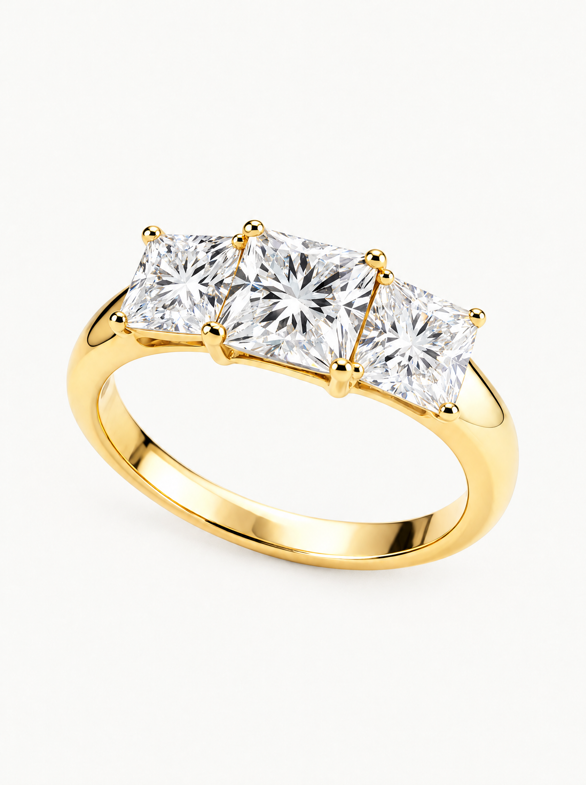 5.50 ctw Princess Three Stone Lab-Grown Diamond Engagement Ring in 14K yellow gold, angled side view — Bow Tie Lab Diamonds