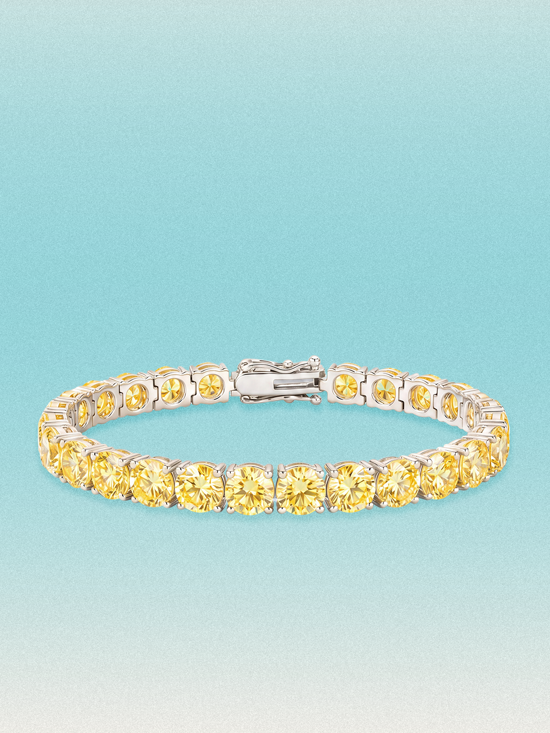 Bow Tie Lab Diamonds Fancy Yellow 6.35mm (26.00 ctw) Round 4-Prong lab-grown diamond tennis bracelet — 26 round yellow lab-grown diamonds, 26.00 ctw total, 7-inch, shown in 14K white gold.