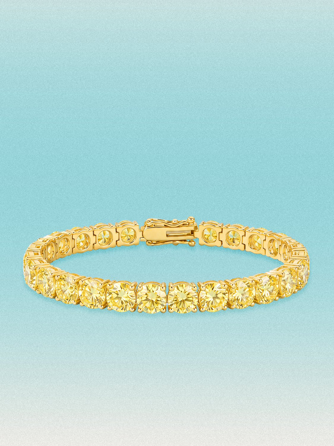 Bow Tie Lab Diamonds Fancy Yellow 6.35mm (26.00 ctw) Round 4-Prong lab-grown diamond tennis bracelet — 26 round yellow lab-grown diamonds, 26.00 ctw total, 7-inch, shown in 14K yellow gold.