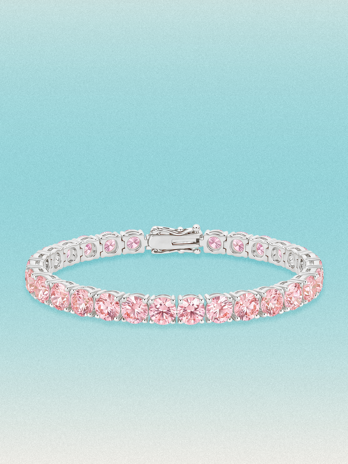 Bow Tie Lab Diamonds Fancy Pink 6mm (21.00 ctw) Round 4-Prong lab-grown diamond tennis bracelet — 28 round pink lab-grown diamonds, 21.00 ctw total, 7-inch, shown in 14K white gold.
