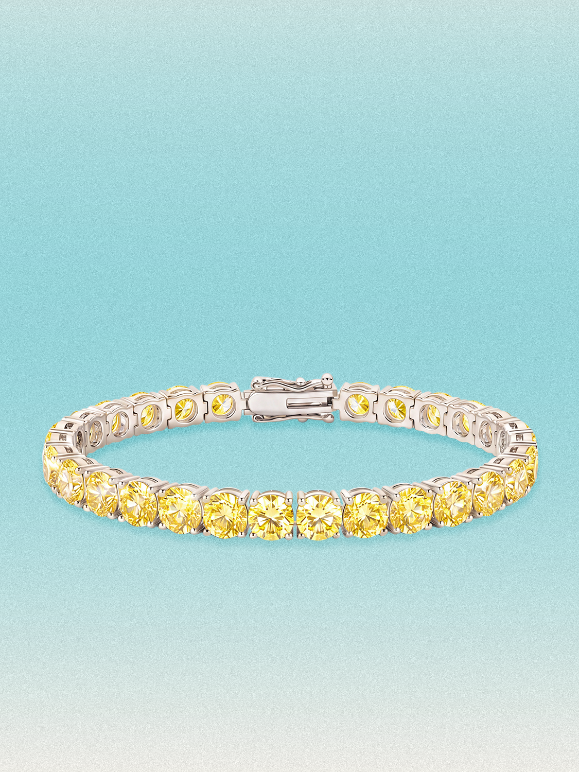 Bow Tie Lab Diamonds Fancy Yellow 6mm (21.00 ctw) Round 4-Prong lab-grown diamond tennis bracelet — 28 round yellow lab-grown diamonds, 21.00 ctw total, 7-inch, shown in 14K white gold.