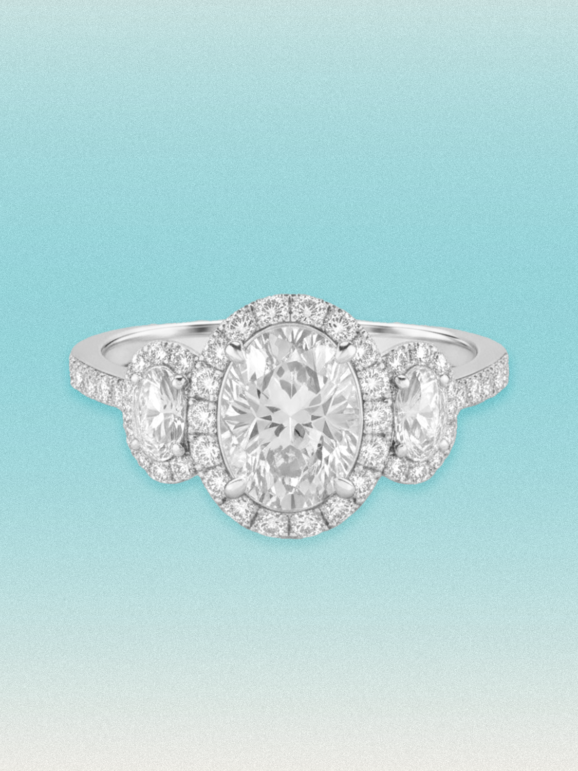 7.00 ctw Oval Three-Stone Halo Pave Lab Grown Diamond Engagement Ring