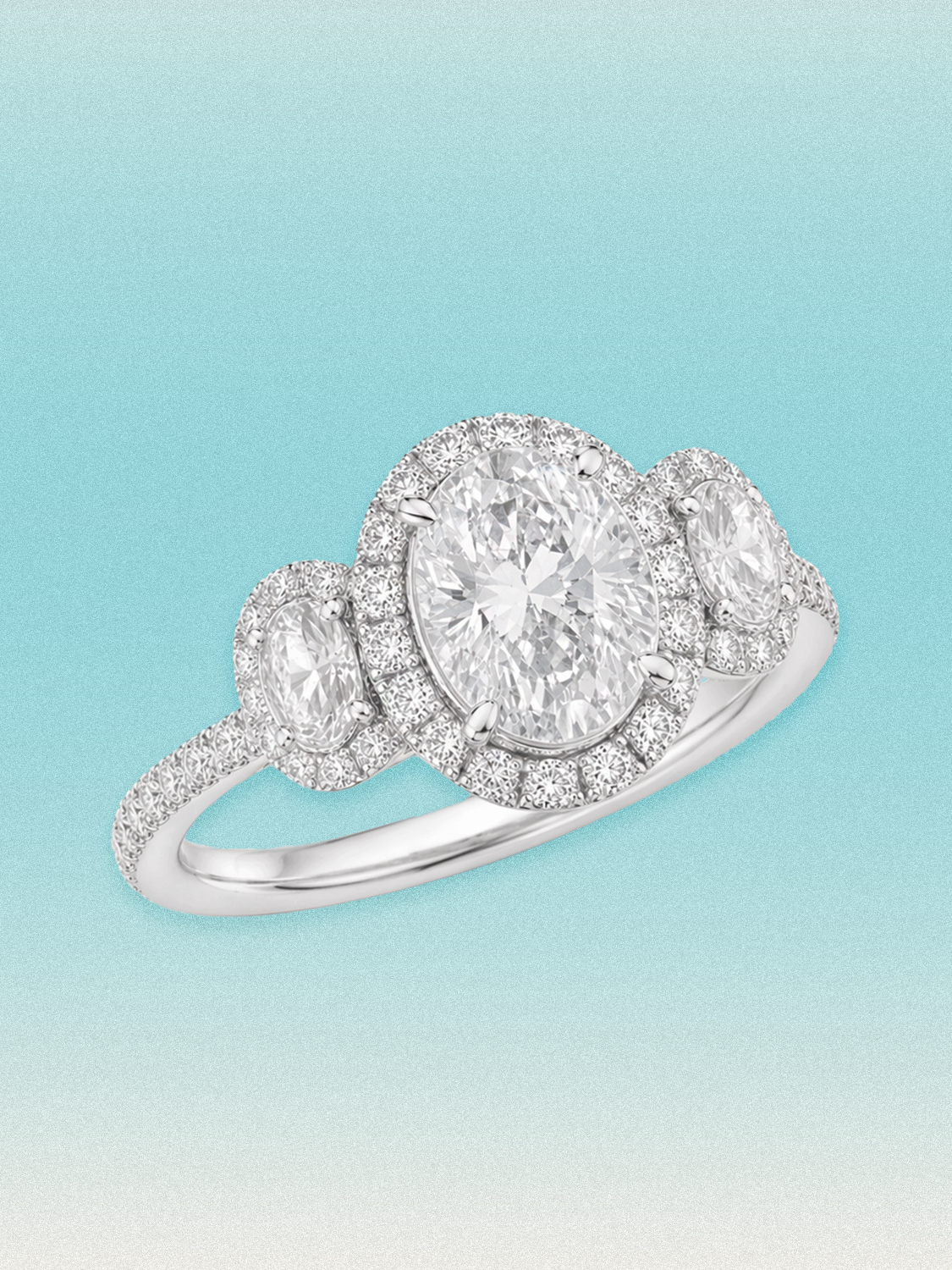 7.00 ctw Oval Three-Stone Halo Pave Lab Grown Diamond Ring