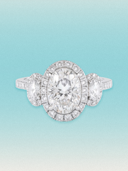 7.00 ctw Oval Three-Stone Halo Pave Lab Grown Diamond Engagement Ring