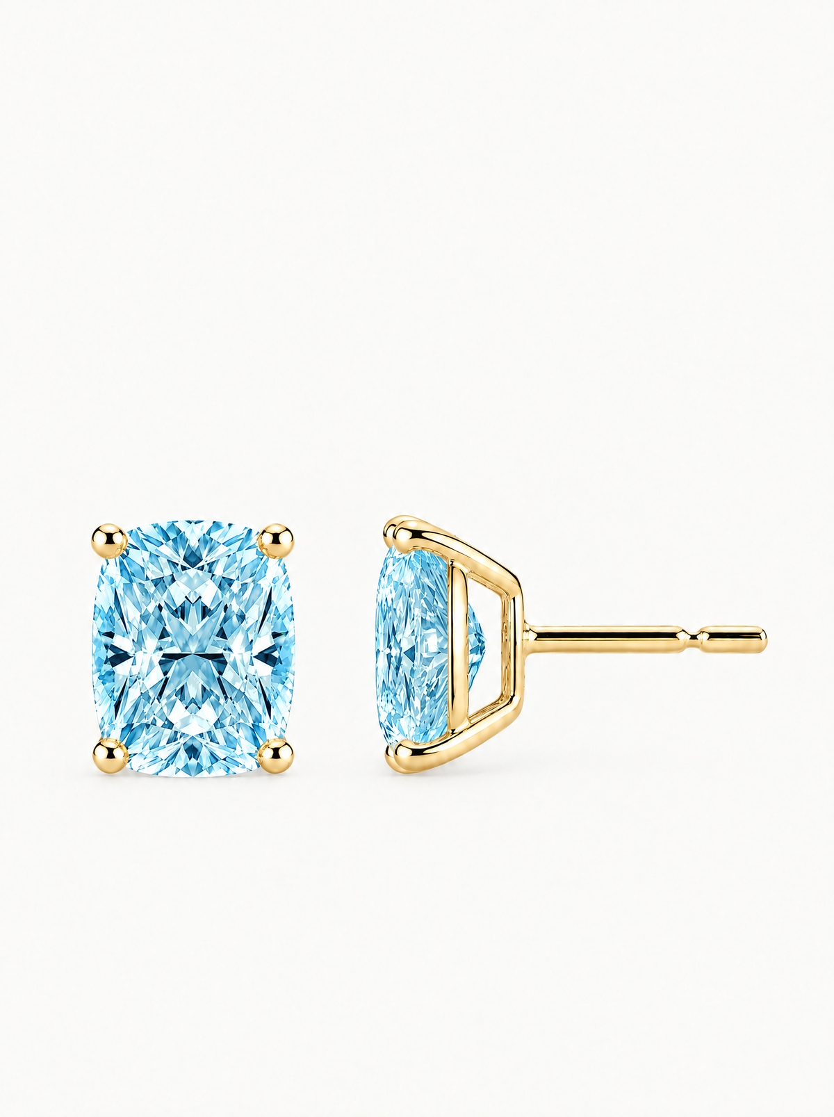 Fancy Blue Cushion Cut Lab-Grown Diamond Stud Earrings in 14K yellow gold, side view — Bow Tie Lab Diamonds
