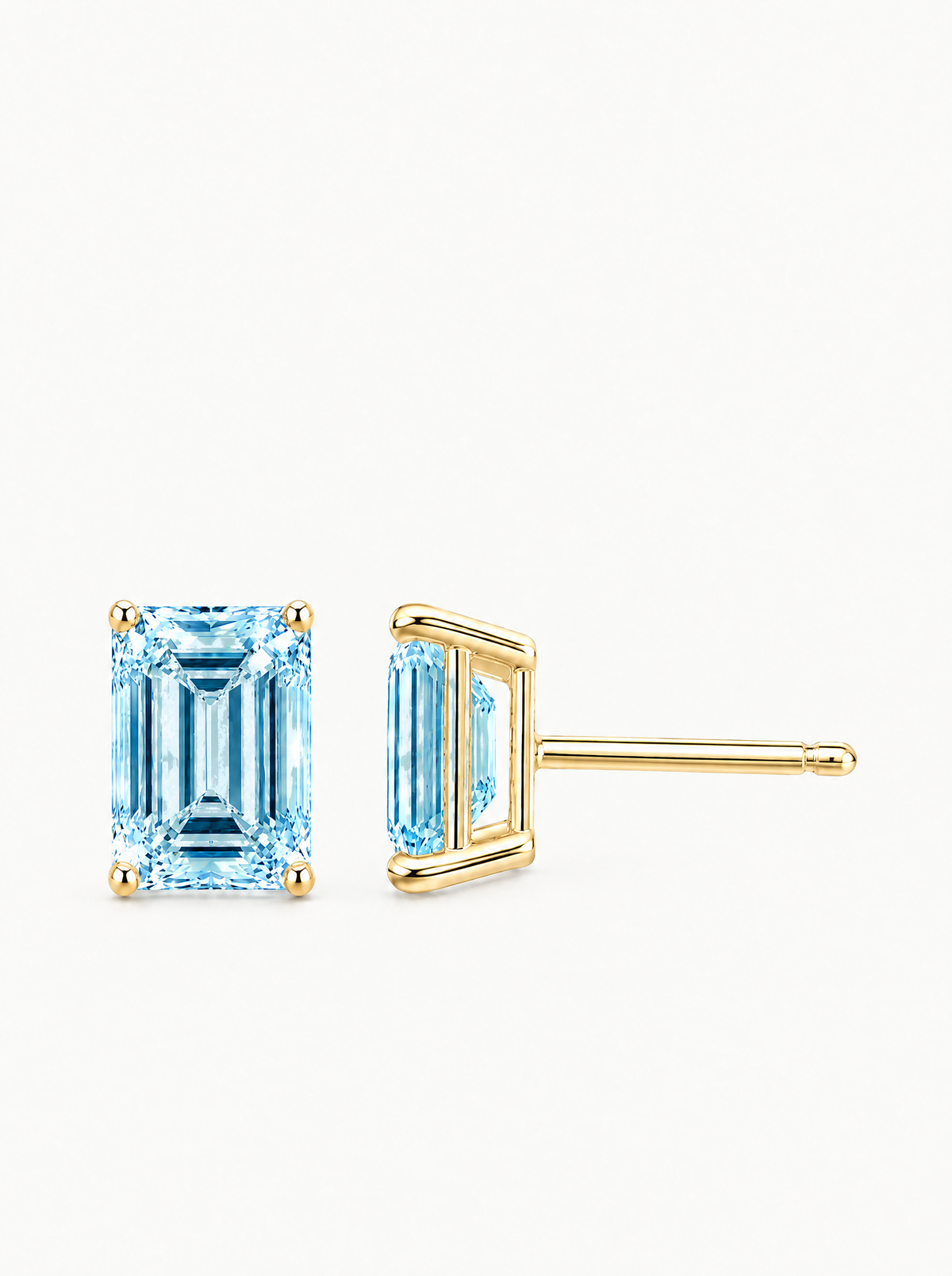 Fancy Blue Emerald Cut Lab-Grown Diamond Stud Earrings in 14K yellow gold, side view — Bow Tie Lab Diamonds
