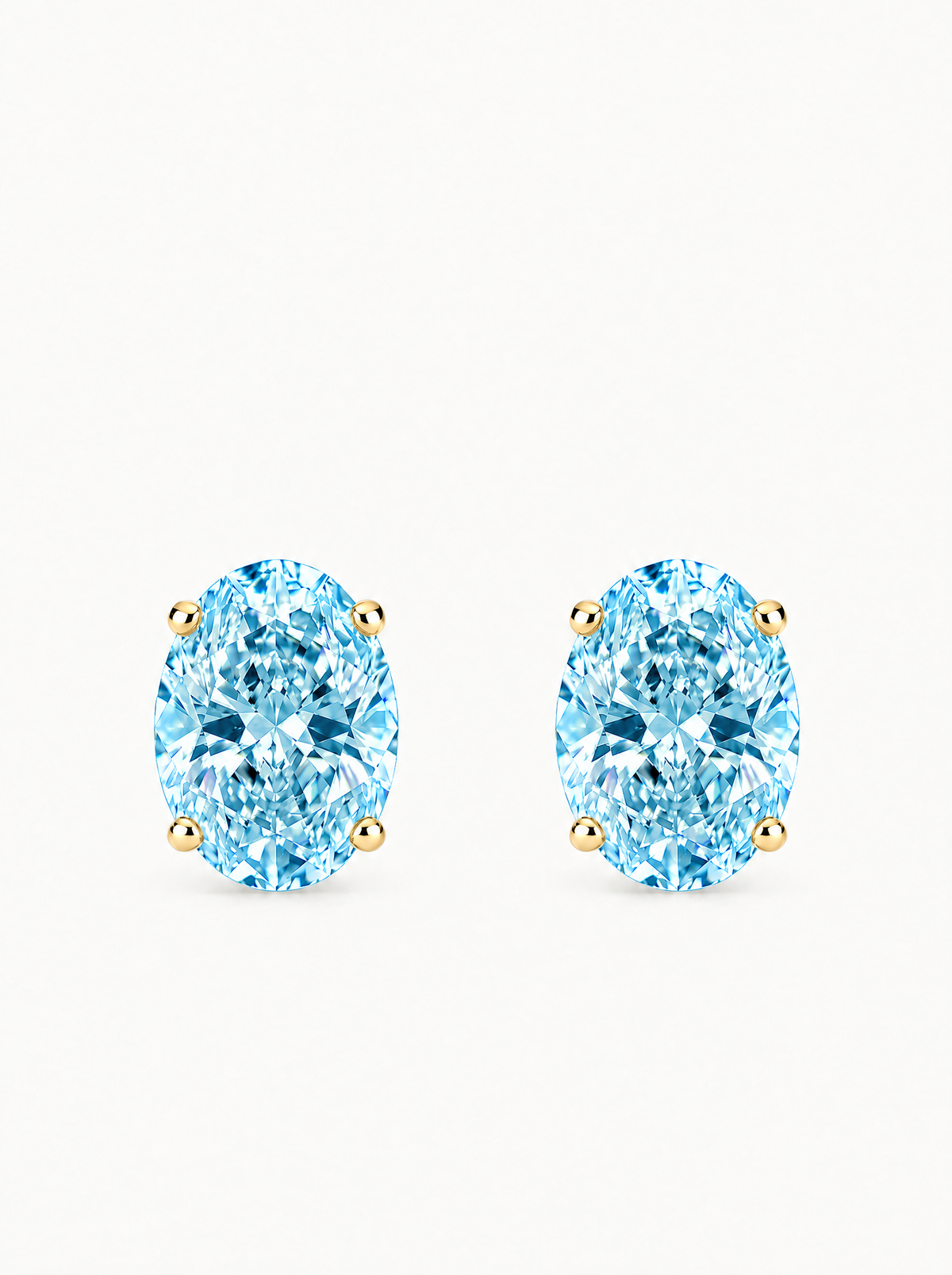 Fancy Blue Oval Cut Lab-Grown Diamond Stud Earrings in 14K yellow gold, front view — Bow Tie Lab Diamonds