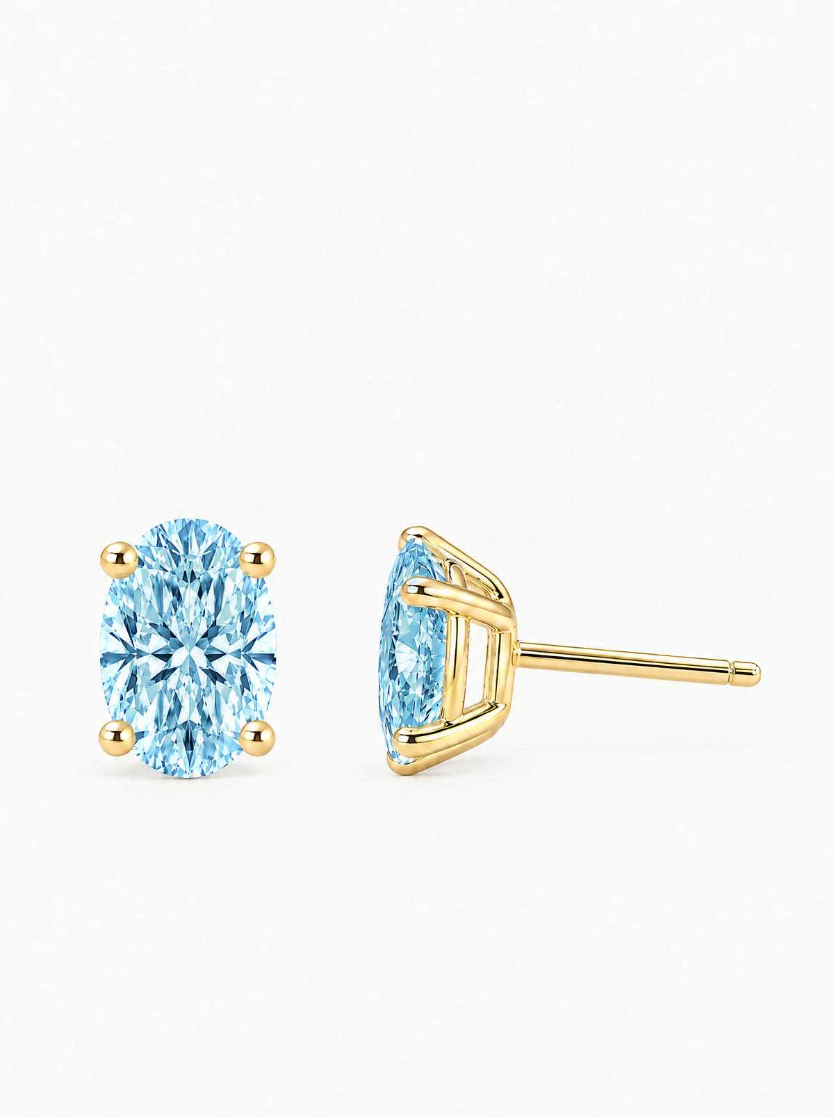 Fancy Blue Oval Cut Lab-Grown Diamond Stud Earrings in 14K yellow gold, side view — Bow Tie Lab Diamonds