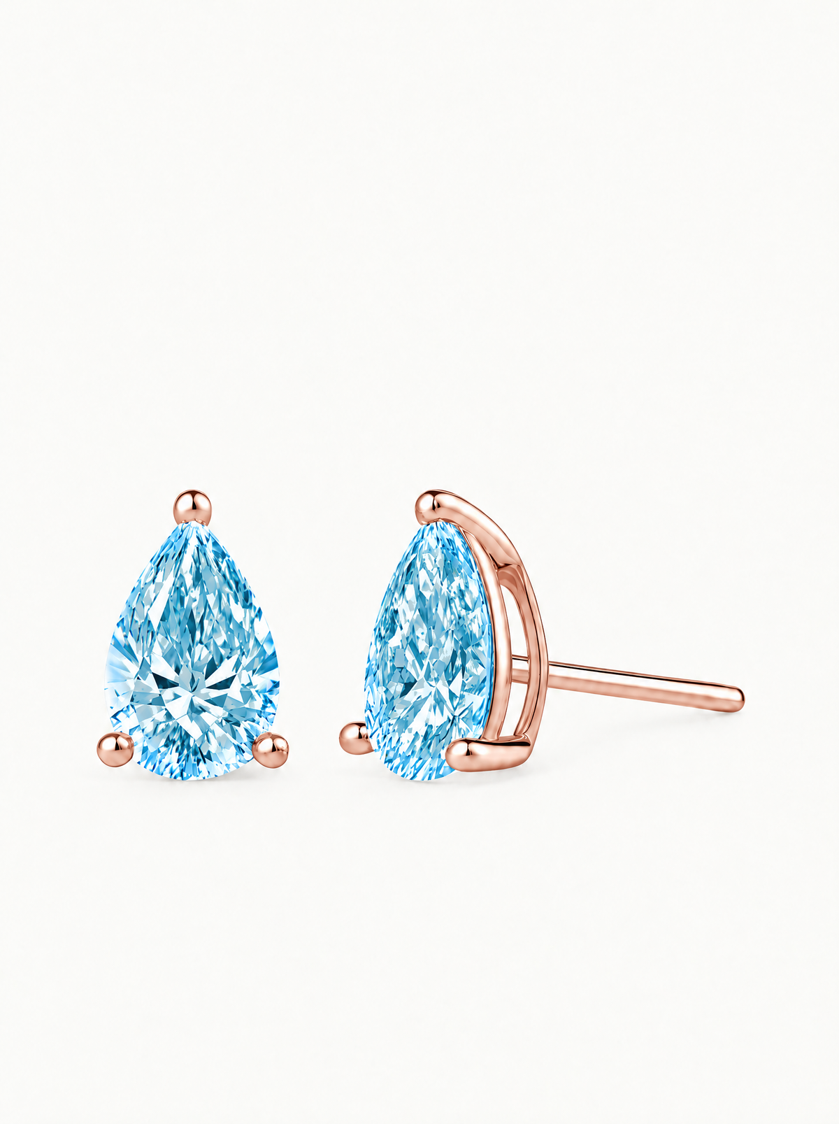 Fancy Blue Pear Cut Lab-Grown Diamond Stud Earrings in 14K rose gold — Bow Tie Lab Diamonds