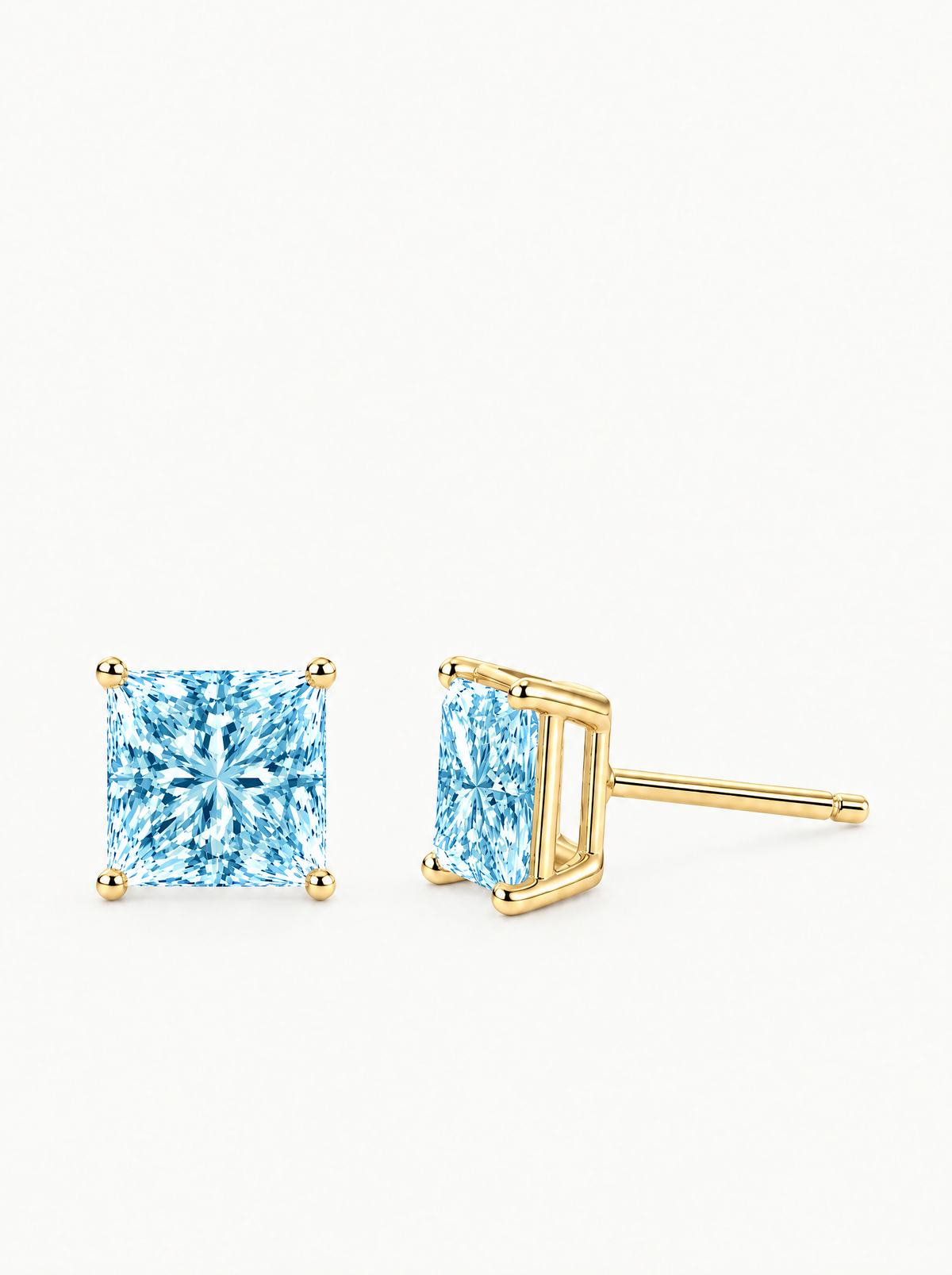 Fancy Blue Princess Cut Lab-Grown Diamond Stud Earrings in 14K yellow gold, side view — Bow Tie Lab Diamonds