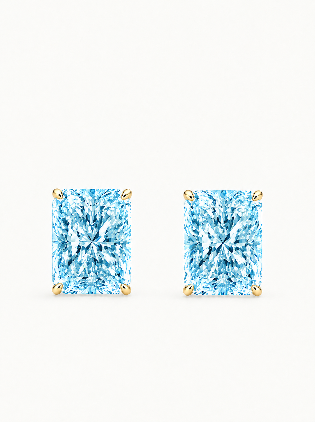 Fancy Blue Radiant Cut Lab-Grown Diamond Stud Earrings in 14K yellow gold, front view — Bow Tie Lab Diamonds