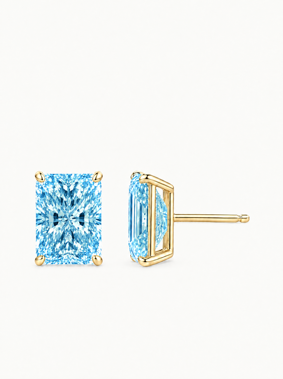 Fancy Blue Radiant Cut Lab-Grown Diamond Stud Earrings in 14K yellow gold, side view — Bow Tie Lab Diamonds