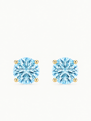 Fancy Blue Round Cut Lab-Grown Diamond Stud Earrings in 14K yellow gold, front view — Bow Tie Lab Diamonds