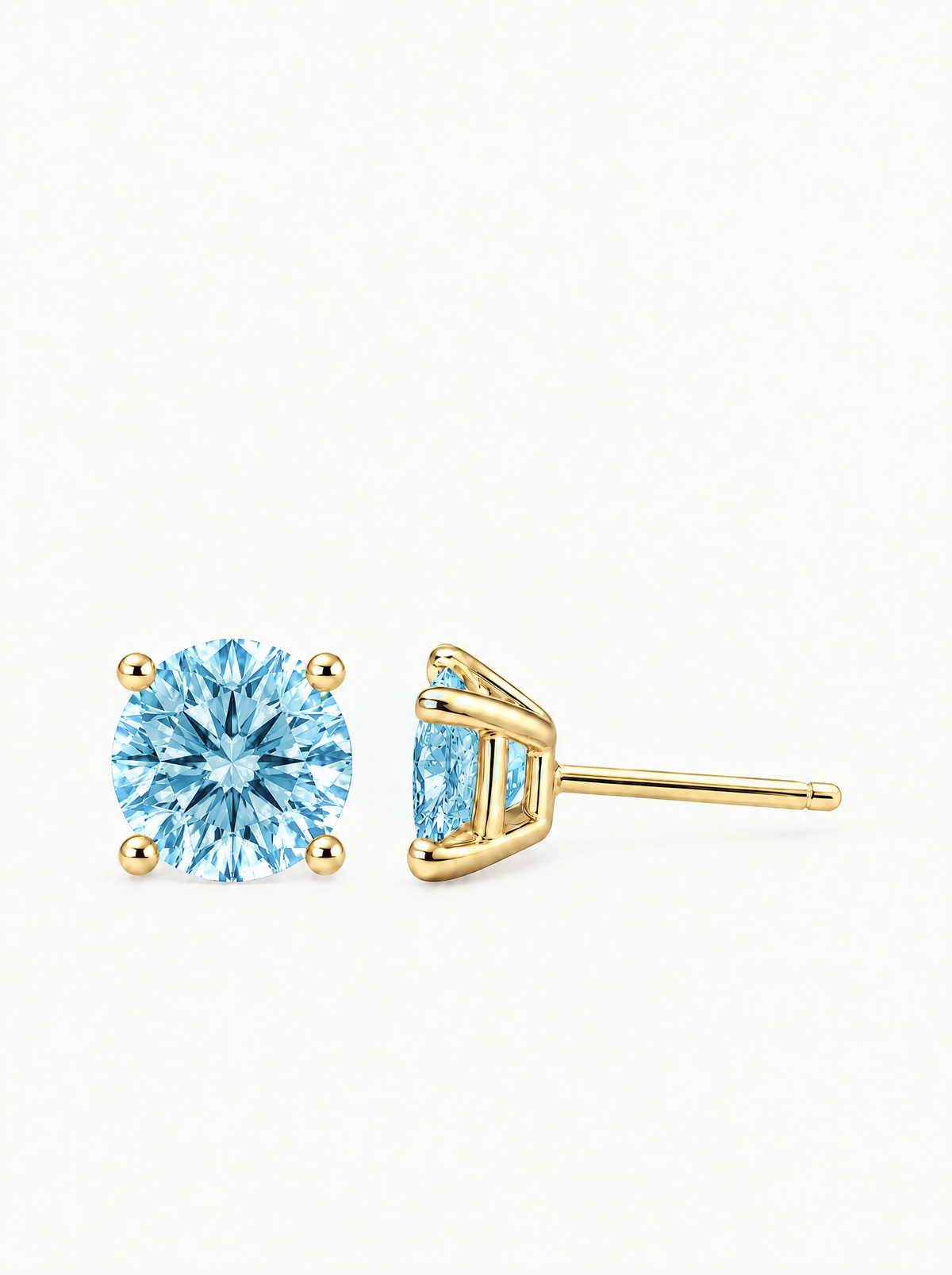 Fancy Blue Round Cut Lab-Grown Diamond Stud Earrings in 14K yellow gold, side view — Bow Tie Lab Diamonds