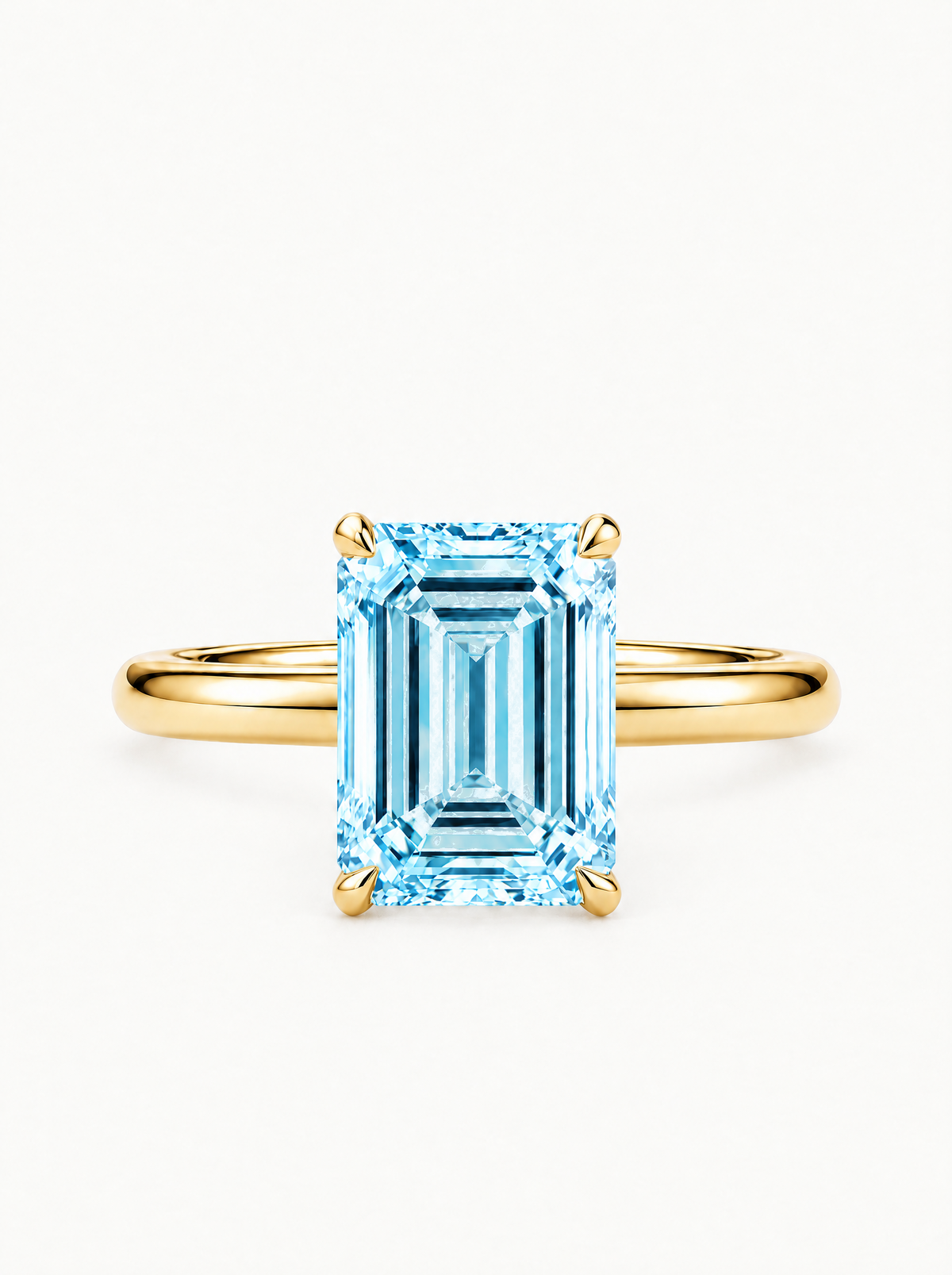 Fancy Blue Emerald Cut Solitaire Lab-Grown Diamond Engagement Ring in 14K yellow gold, front view — Bow Tie Lab Diamonds
