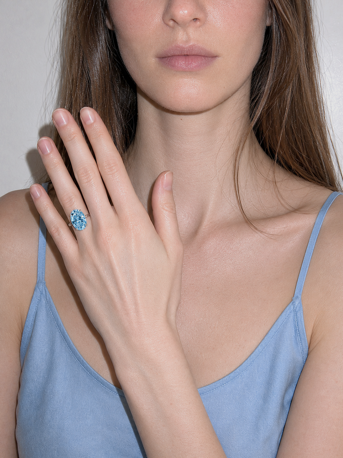 Fancy Blue Oval Cut Solitaire Lab-Grown Diamond Engagement Ring, worn on the hand — Bow Tie Lab Diamonds