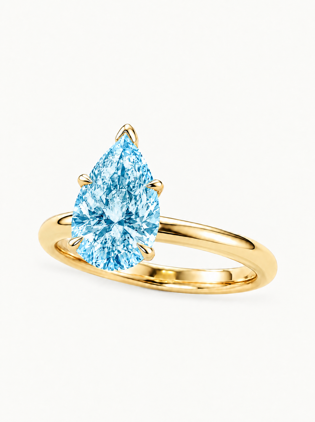 Fancy Blue Pear Cut Solitaire Lab-Grown Diamond Engagement Ring in 14K yellow gold — Bow Tie Lab Diamonds