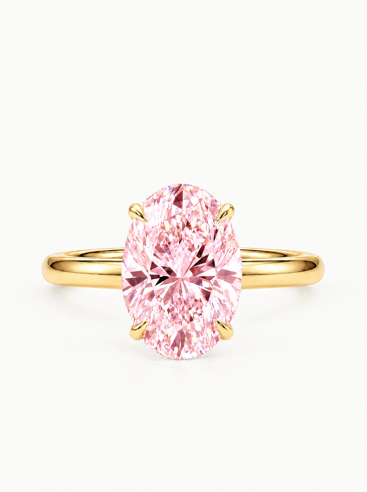 Fancy Pink Oval Cut Solitaire Lab-Grown Diamond Engagement Ring in 14K yellow gold, front view — Bow Tie Lab Diamonds