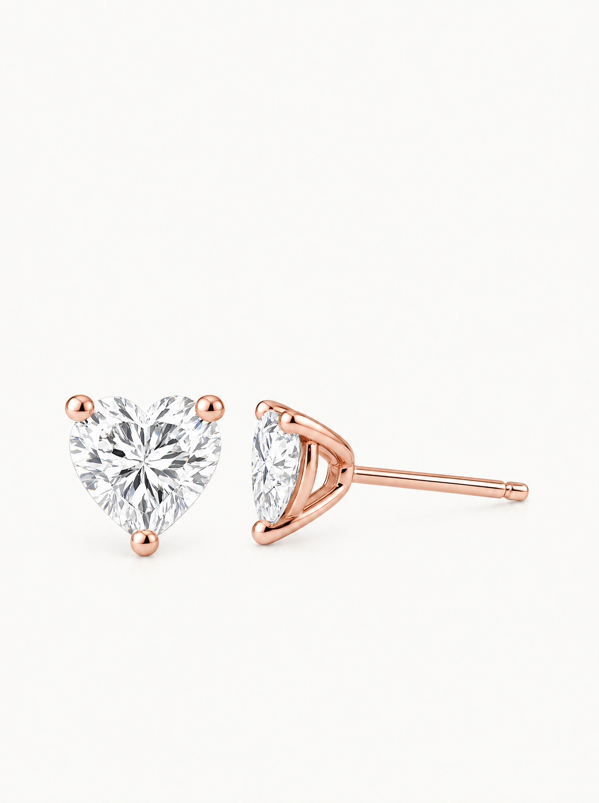 Heart Cut Lab-Grown Diamond Stud Earrings in 14K rose gold, front view — Bow Tie Lab Diamonds