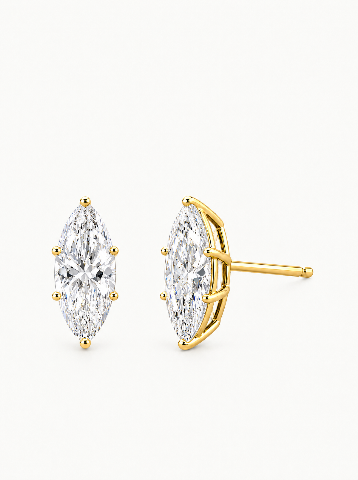 Marquise Cut Lab-Grown Diamond Stud Earrings in 14K yellow gold, angled side view — Bow Tie Lab Diamonds