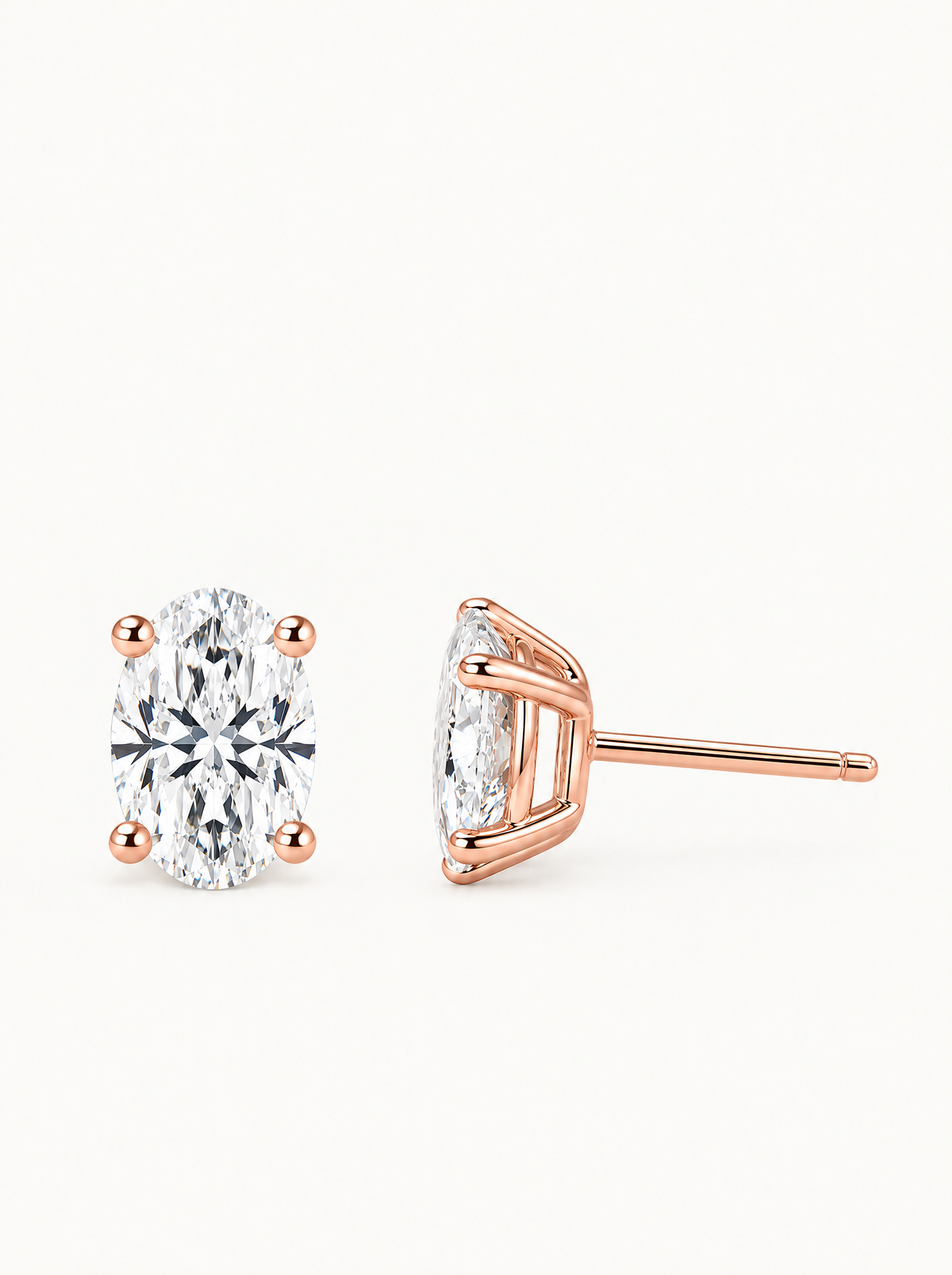 Oval Cut Lab-Grown Diamond Stud Earrings in 14K rose gold, front view — Bow Tie Lab Diamonds