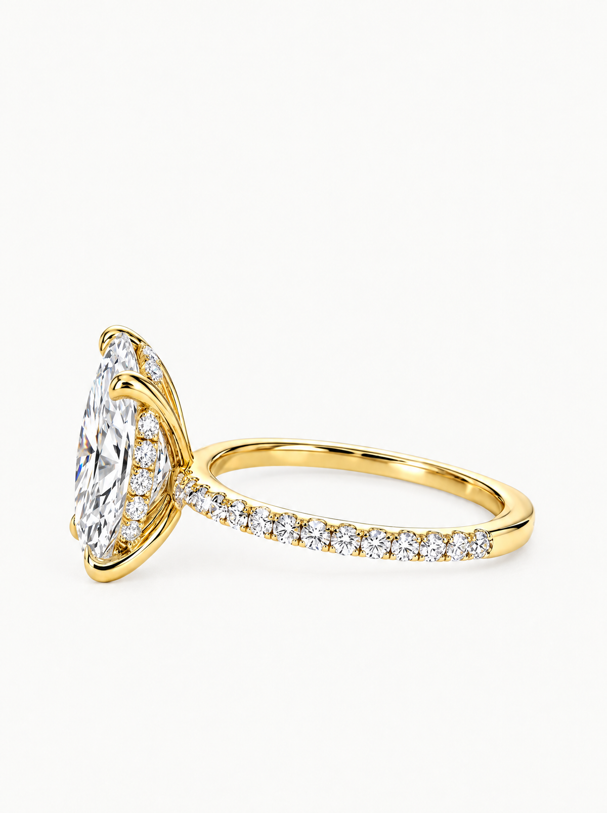 Oval Cut Solitaire Hidden Halo Lab-Grown Diamond Engagement Ring in 14K yellow gold, angled side view — Bow Tie Lab Diamonds