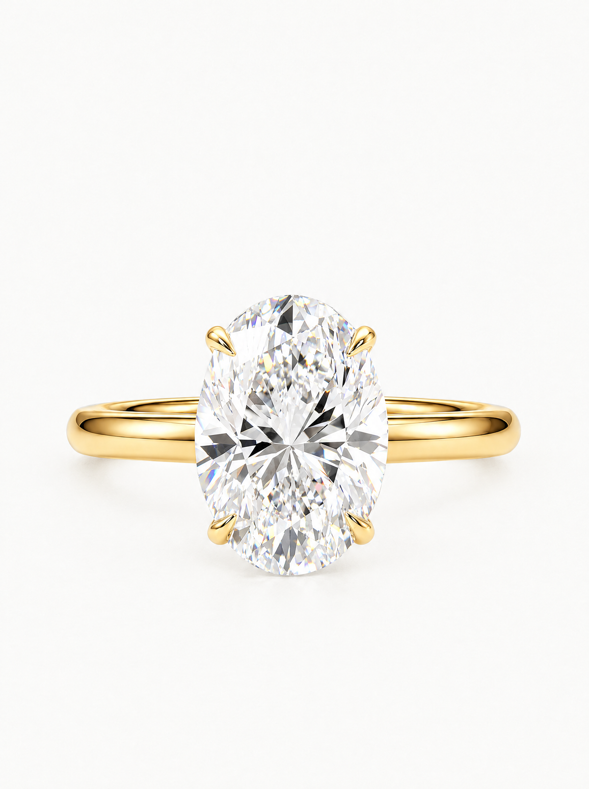 Oval Cut Solitaire Lab-Grown Diamond Engagement Ring in 14K yellow gold, front view — Bow Tie Lab Diamonds