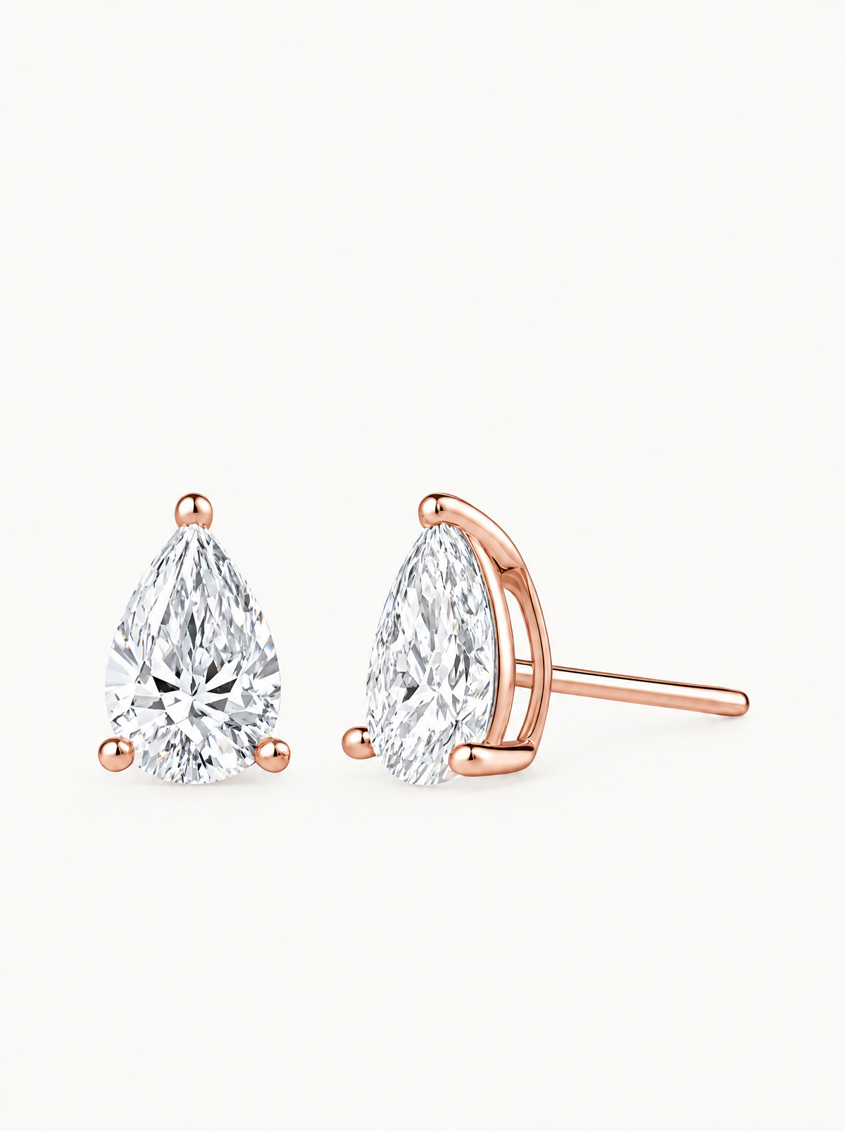 Pear Cut Lab-Grown Diamond Stud Earrings in 14K rose gold, front view — Bow Tie Lab Diamonds