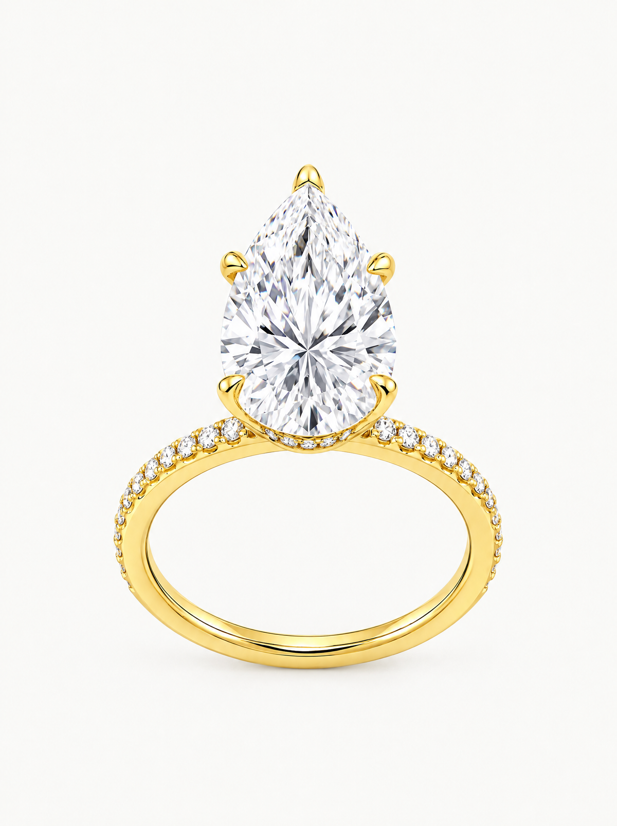 Pear Cut Solitaire Hidden Halo Lab-Grown Diamond Engagement Ring in 14K yellow gold, angled side view — Bow Tie Lab Diamonds