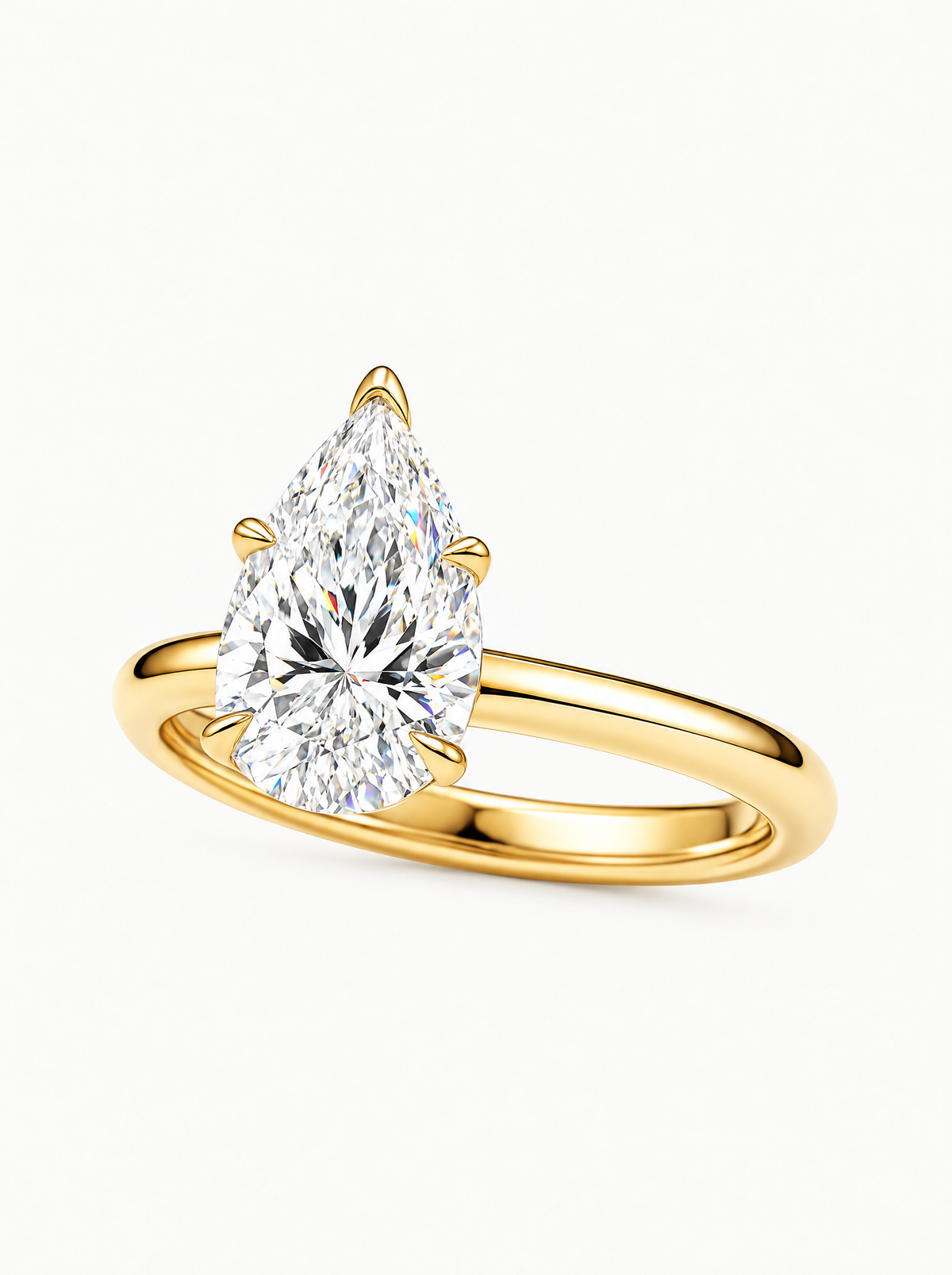 Pear Cut Solitaire Lab-Grown Diamond Engagement Ring in 14K yellow gold, angled side view — Bow Tie Lab Diamonds